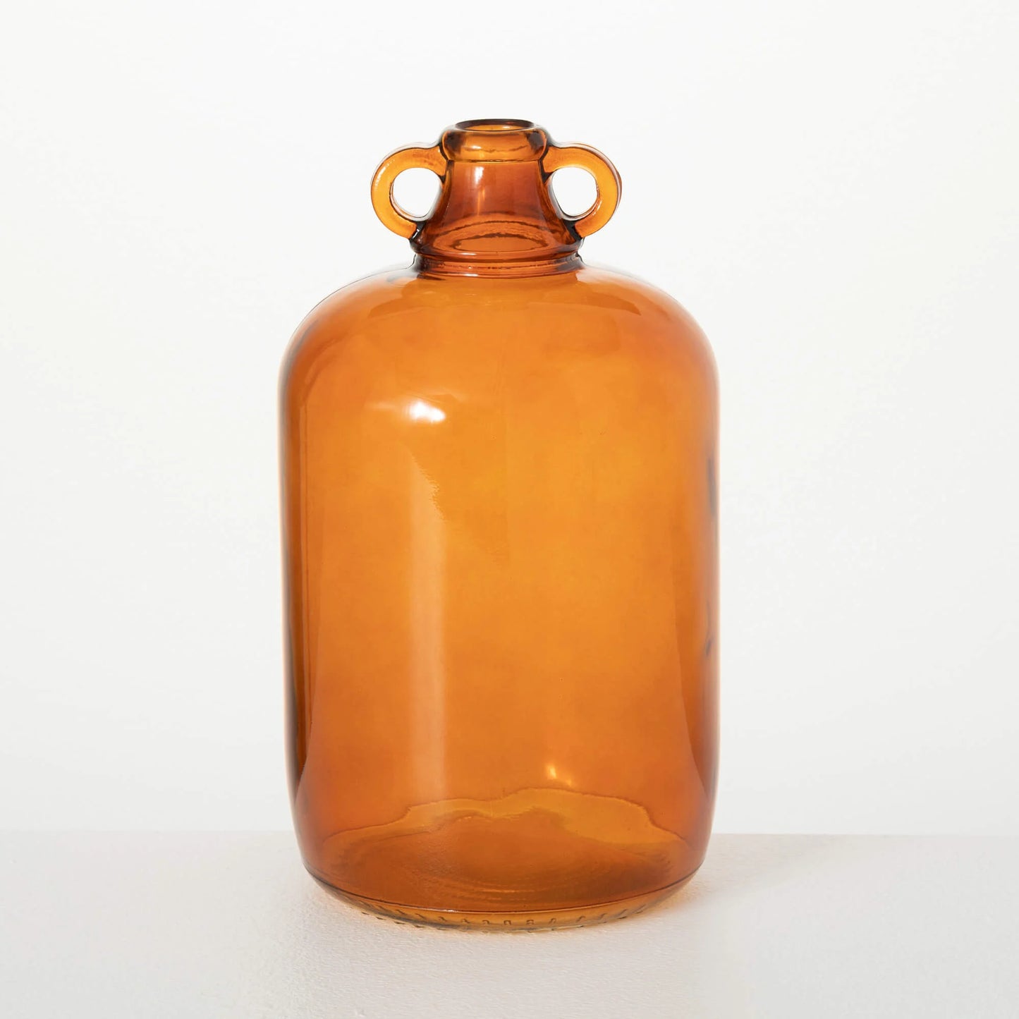 101. Handled Amber Glass Jug